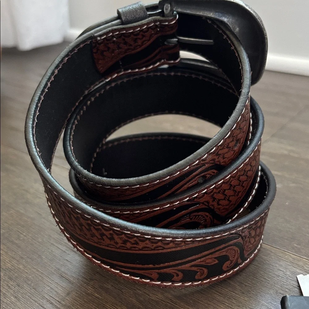 Ridge Mountain Genuine tooled leather,single stitch, silvertone embossed buckle